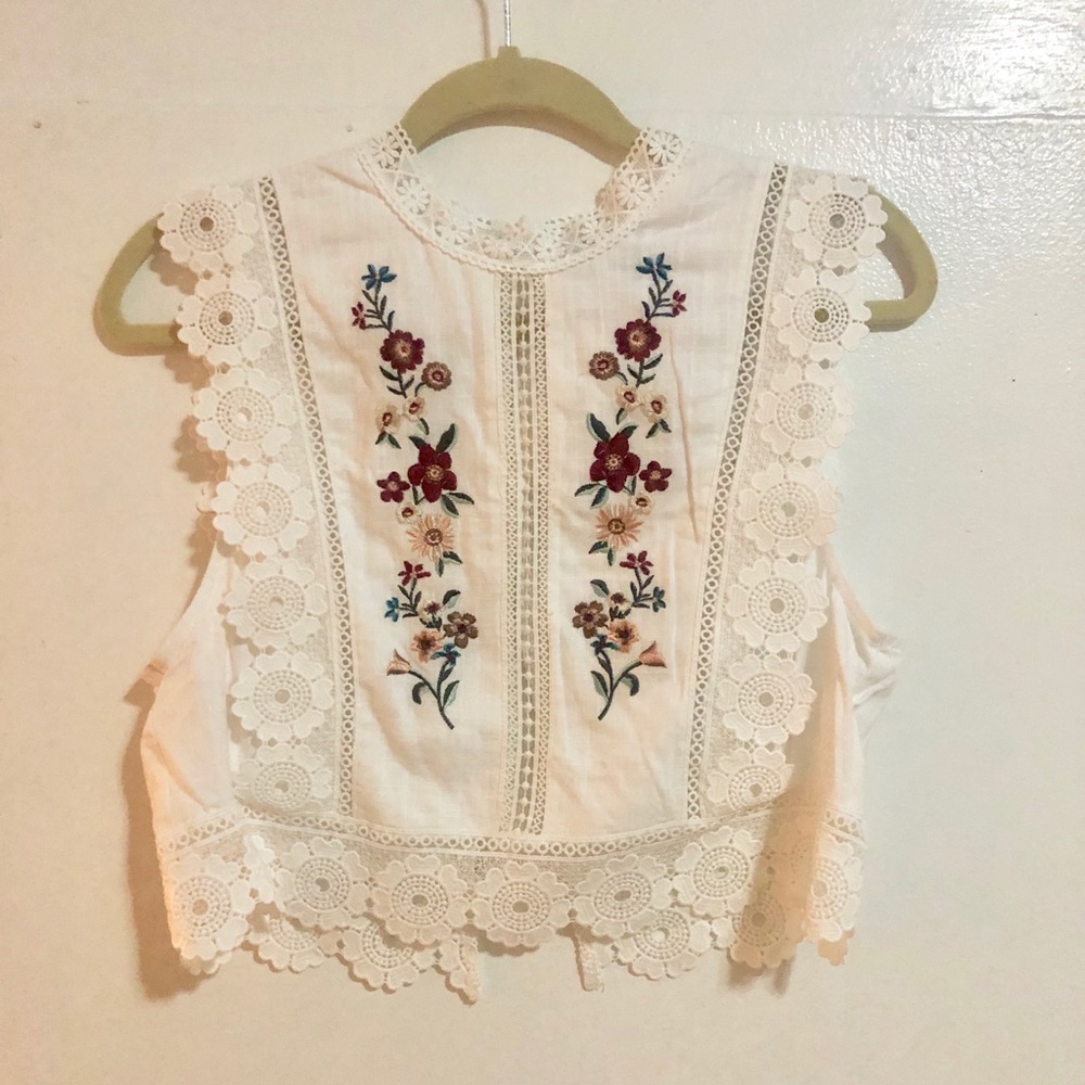 White, embroidered crop top.